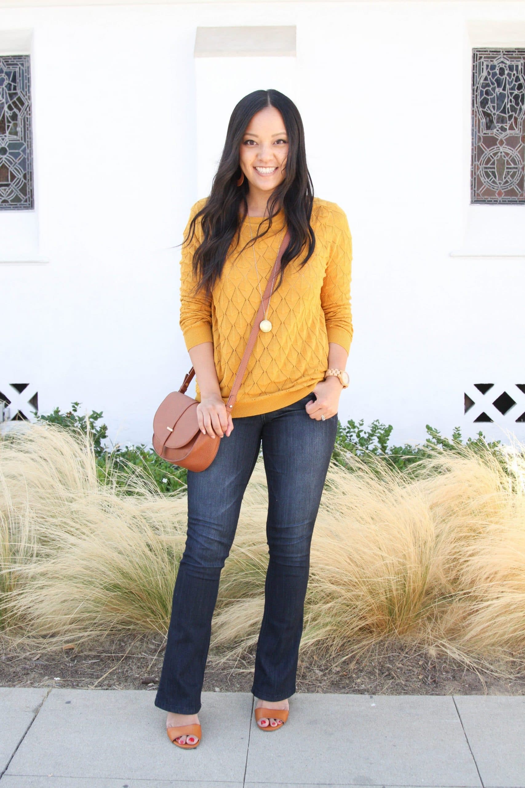 Mustard knit sweater and bootcut jeans 