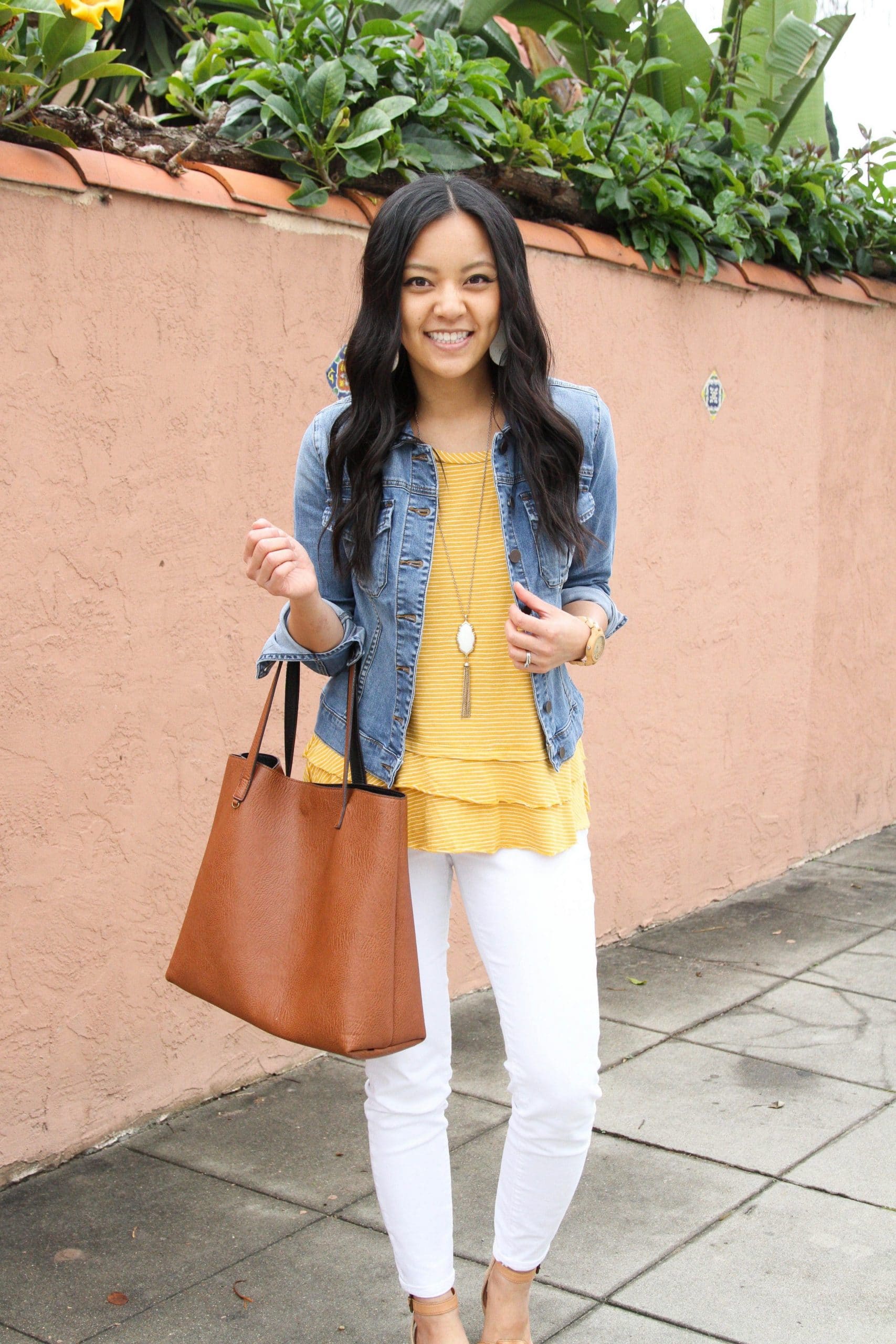 yellow top, jean jacket, pendant necklace, white jeans, cognac tote front  view - Putting Me Together